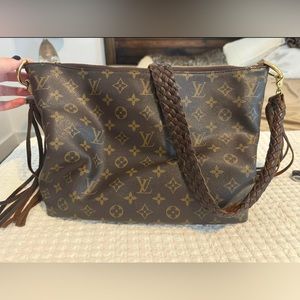 Sully Handbag Monogram Canvas PM with a braided leather strap